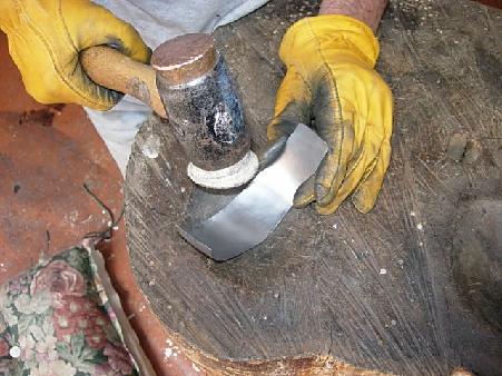 Fig. 37 - hammering into the deeper depression